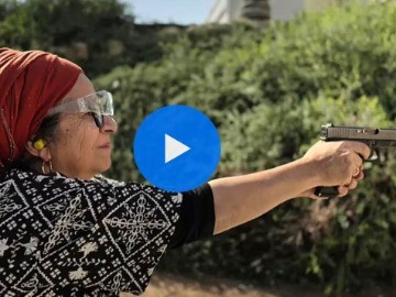 Israeli civilians take up arms in the West Bank after Hamas’ surprise attack